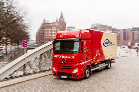 Moving truck on the road for your employee relocation